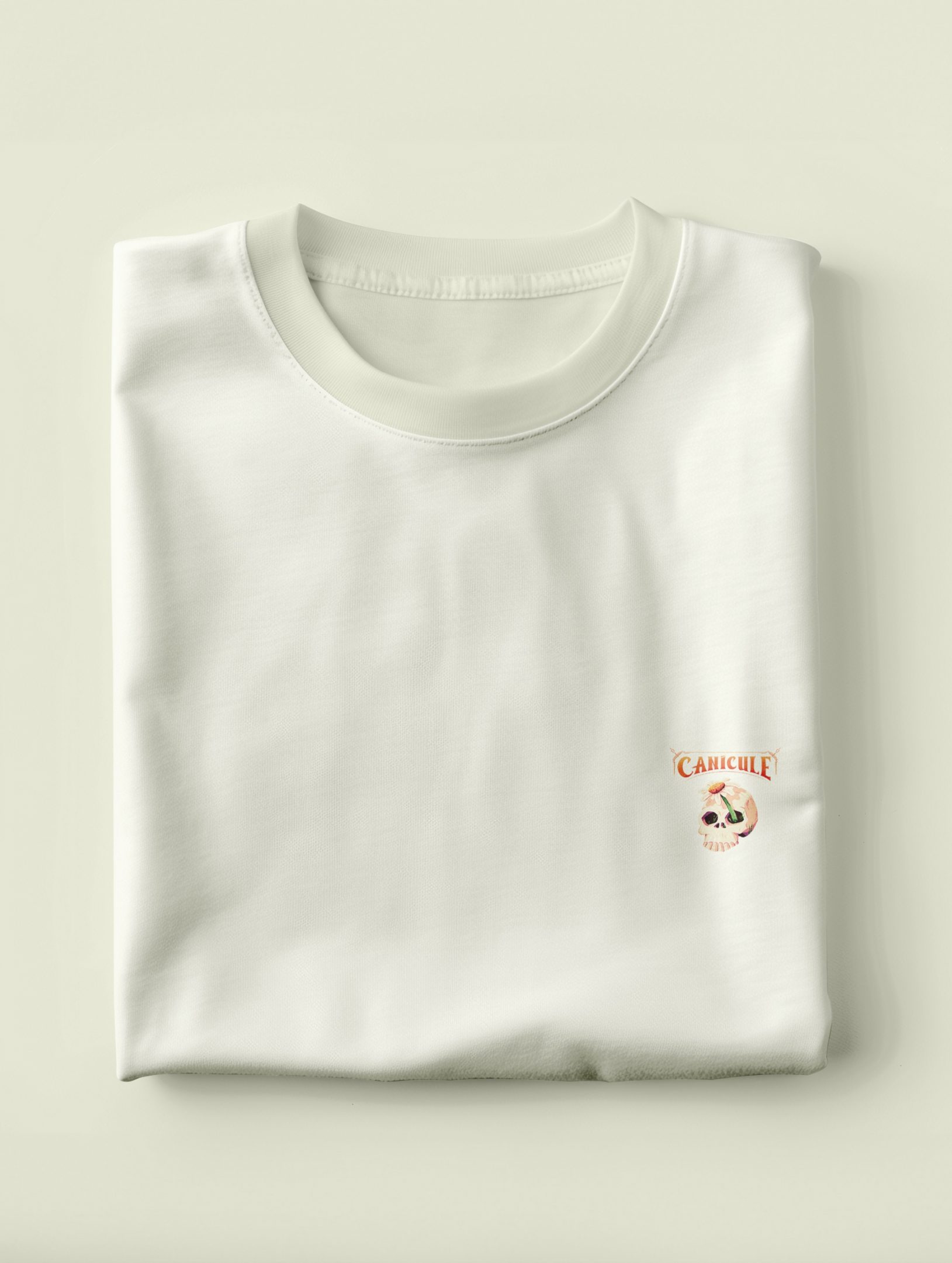 Mockup of the front t-shirt bended with the skull and the flower as a brand logo